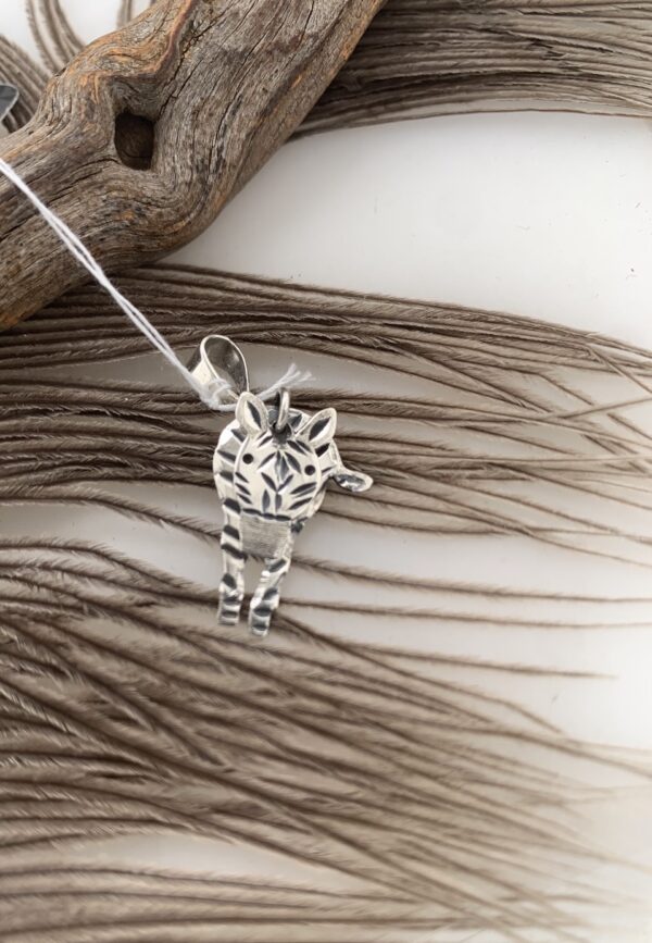 S.S mobile hand cut Zebra pendant
